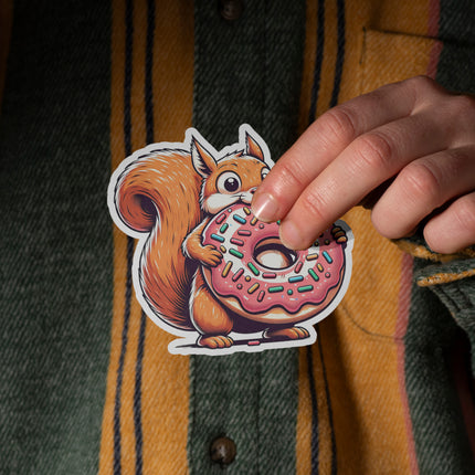 SQUIRREL EATING DONUT